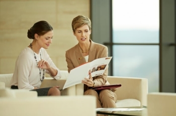 female financial advisor consulting with client